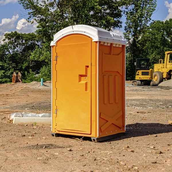 how often are the porta potties cleaned and serviced during a rental period in West Amana